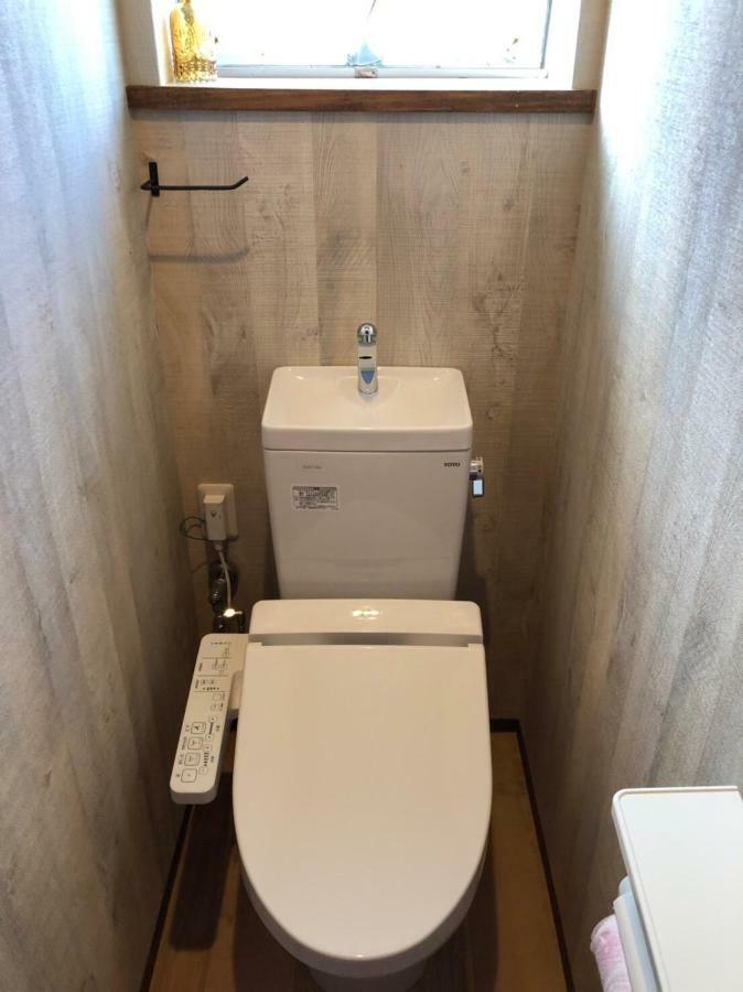 奄美市奄美ウイークリーハウス Nico nico 名瀬港店アパートメント エクステリア 写真